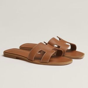 AUTHENTIC Hermes Oran Sandals in Gold (brown)
